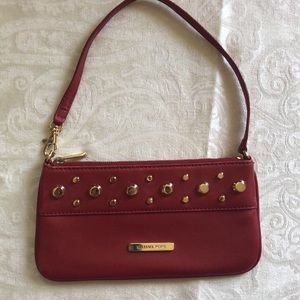 RED CLUTCH BY MICHAEL KORS
